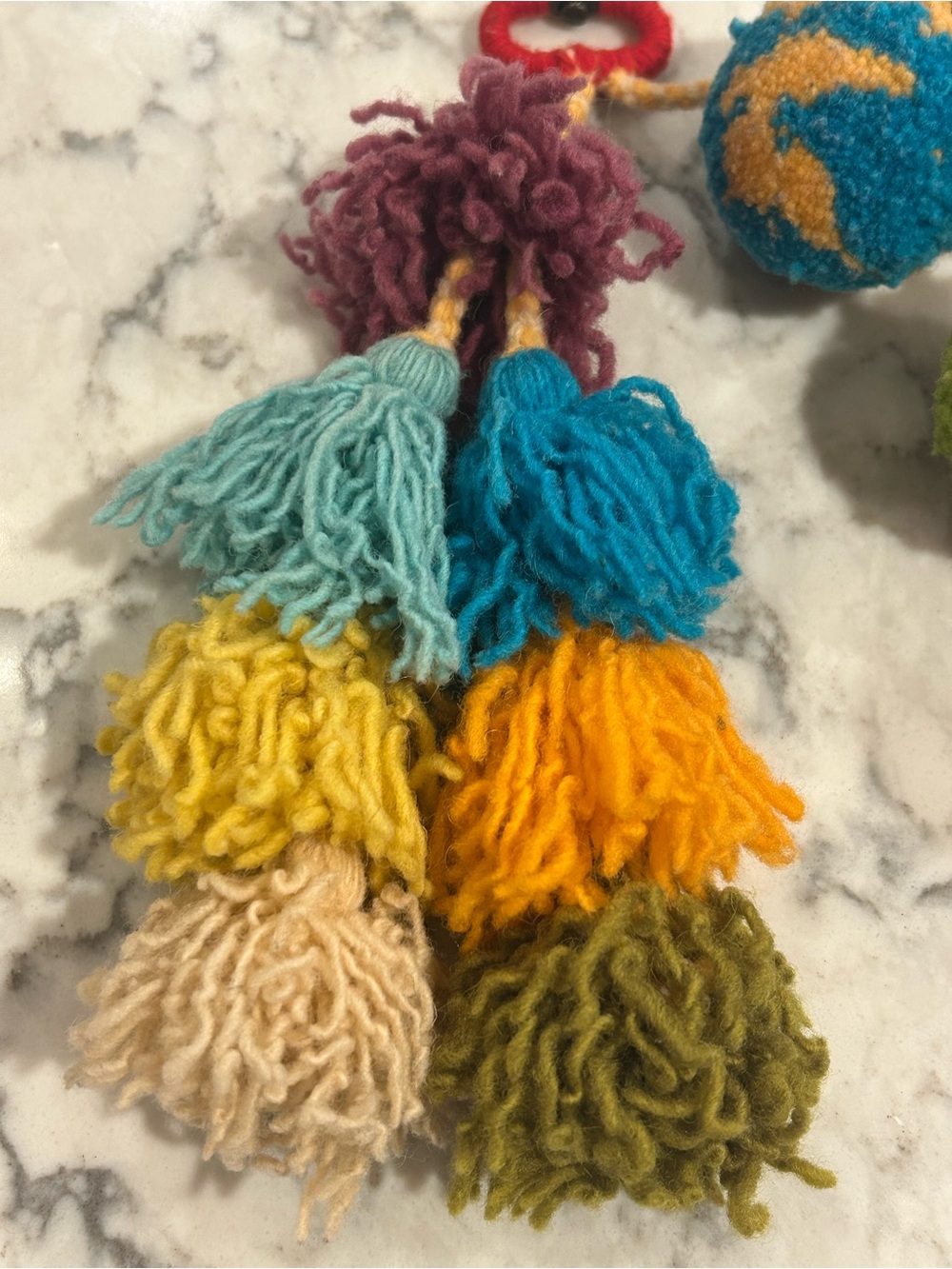 Noonday Collection Vibrant Pom Tassel Bag Charm - Picture 6 of 7